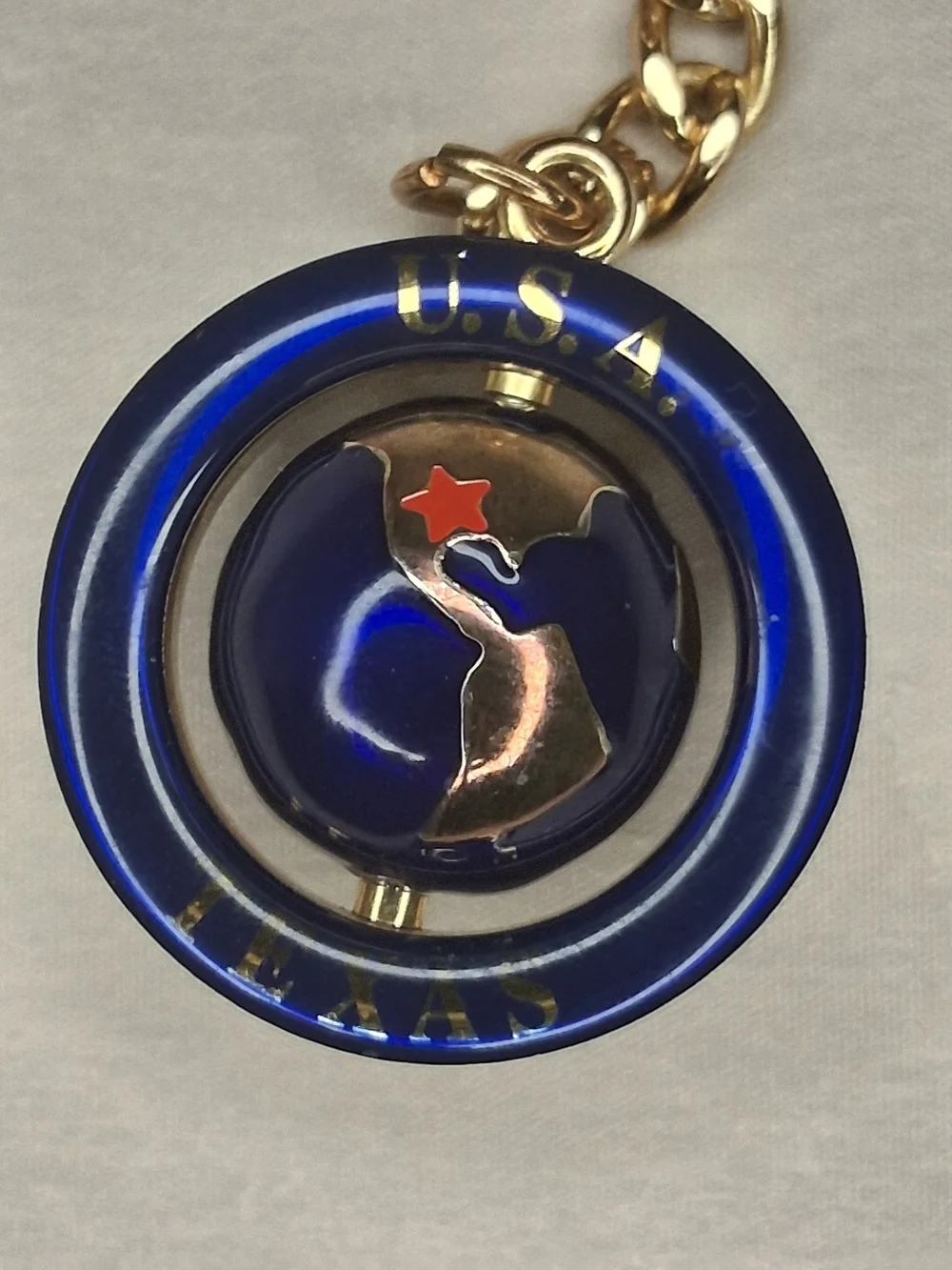 Gold Tone Keyring with Blue Enamel Round Charm